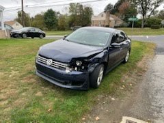 blue VW Passat with body damage new-cumberland-pa-17070