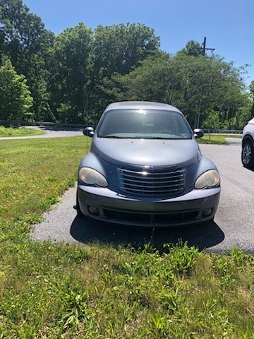 Junk car removal of an abandoned 2007 Chrysler PT Cruiser with flat tires by SellMyJunkCarz in Hummelstown PA.